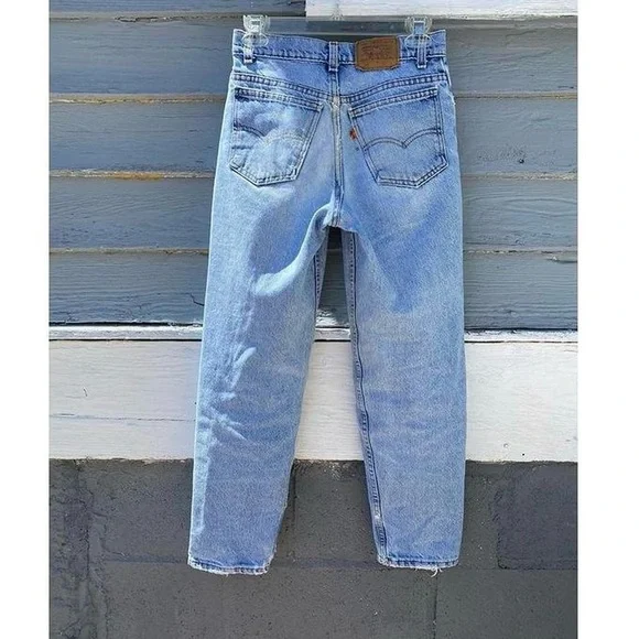 Vintage LEVI’S 550 Student Orange Tab Size 25 Petite Light Wash Patch Distress